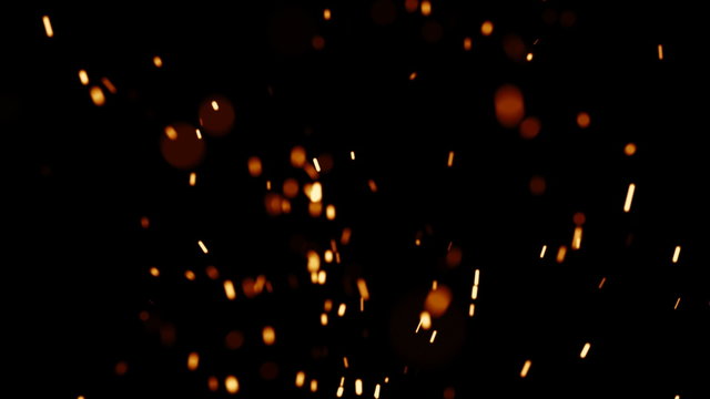 Rising Embers, Medium Flames (25fps). Fire on medium heat, hot burning embers rise up. The shallow focus makes the particles bokeh.