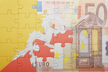 puzzle with the national flag of bhutan and euro banknote