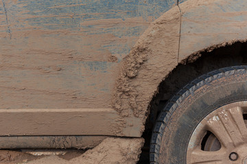 Close up of dirty wheel - off road vehicle with mud