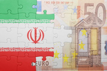puzzle with the national flag of iran and euro banknote
