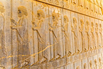 Guardians also known as the Immortals holding a spear, relief detail on the stairway facade of the Apadana at the old city Persepolis.