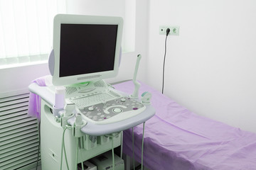 medical room with ultrasound diagnostic equipment