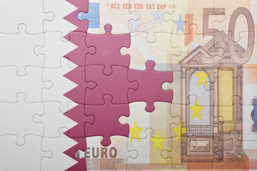 puzzle with the national flag of colombia and euro banknote