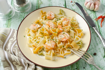 Pasta in cream sauce with shrimp