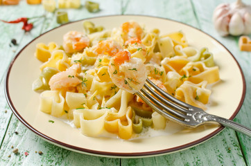 Pasta in cream sauce with shrimp