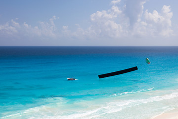 Advertisement beach parachute boat