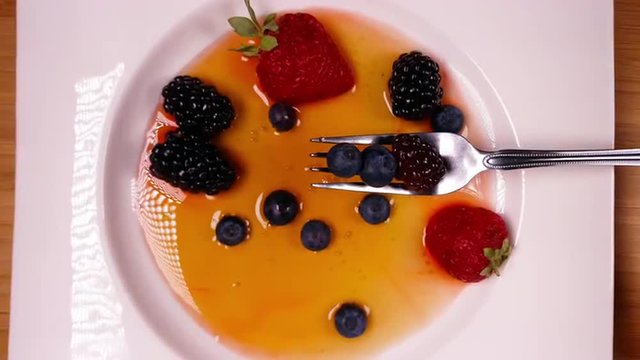 Delicious Dessert Assortment of Fresh Berries  in Sweet Sauce 4K Fruits