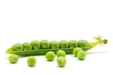 fresh green peas isolated on a white background