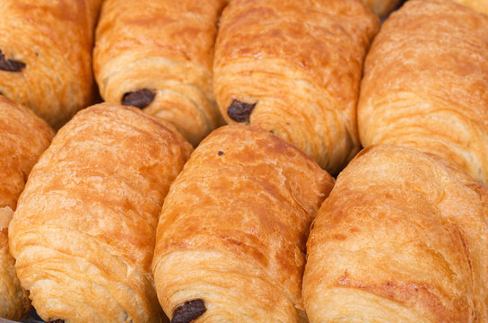 Close up macro shot of a bunch of French chocolatines