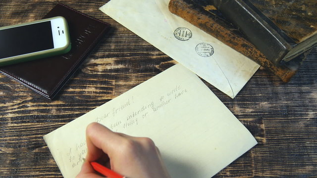Woman hand fast write letter on vintage background