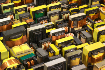 Many old used electrical ferrite power transformers