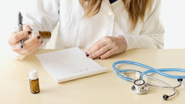 Doctor woman prescription pills