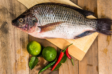 Fresh raw fish on the wood