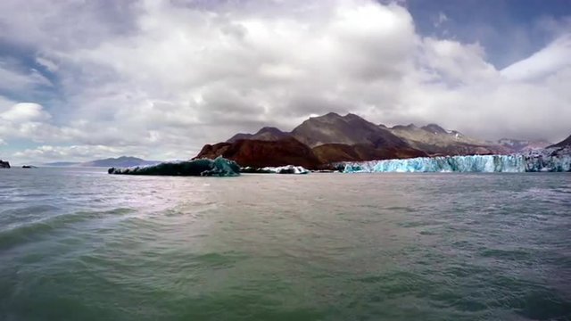 Glacier and floating Icebergs 4K