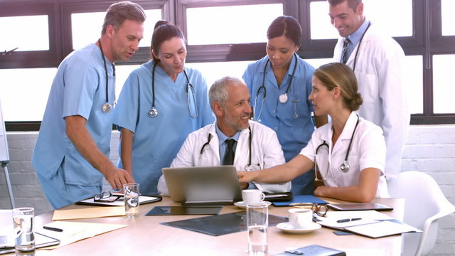   Medical team using laptop