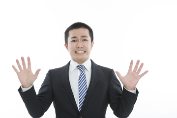 ビジネスマン　驚く　両手を開く　カメラ目線