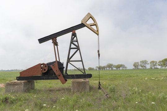 oil pump. Oil industry equipment. Work of oil pump jack on a oil