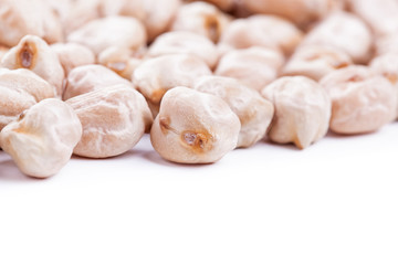 Raw dry chickpeas on white background
