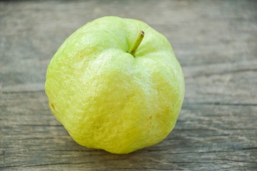 green guava on wood floor