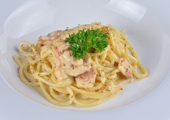 spaghetti carbonara on white  bowl