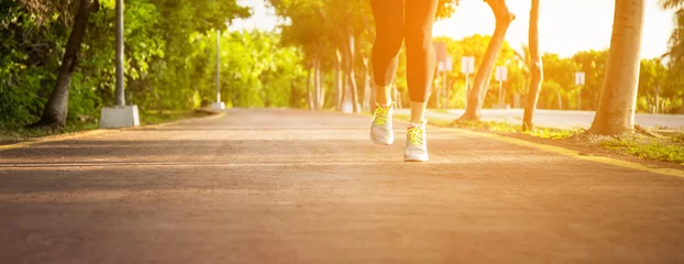 Afwasbaar Fotobehang Joggen Fitness vrouw joggen