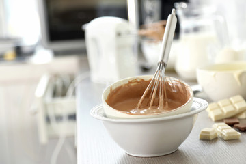 Cooking chocolate cream on kitchen
