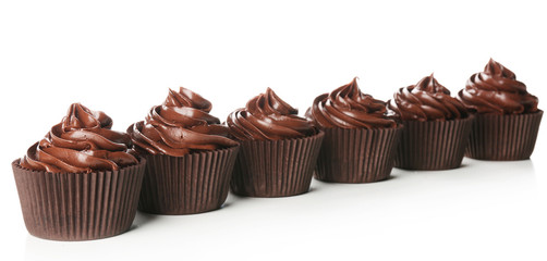 Chocolate cupcakes isolated on white