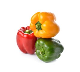 red, yellow, green bell pepper on white background