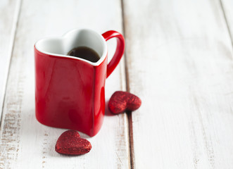 Cup of tea. Red cup in shape of heart