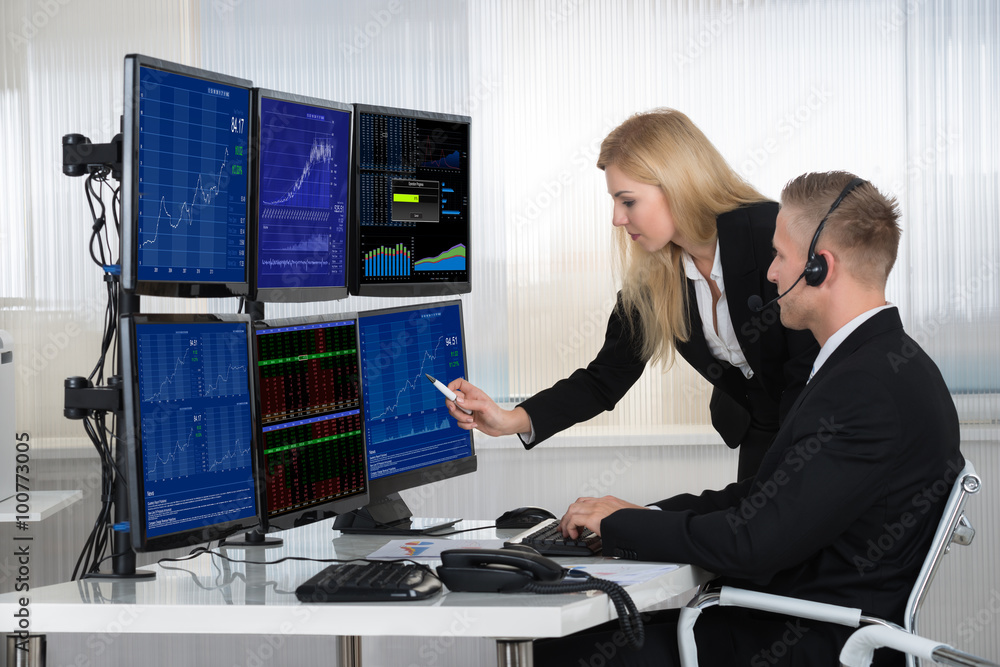 Poster business people analyzing data displayed on computer screens