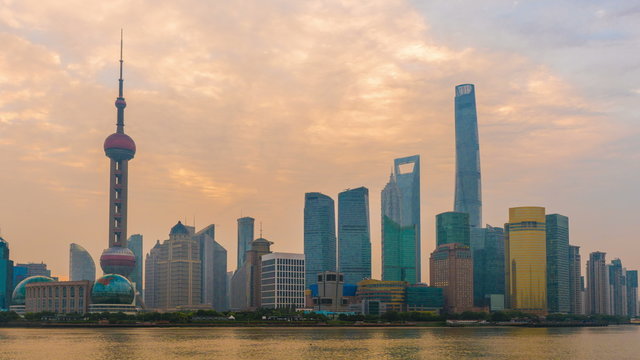 Sunrise Skyline view from Bund waterfront on Pudong New Area- the business quarter of Shanghai .