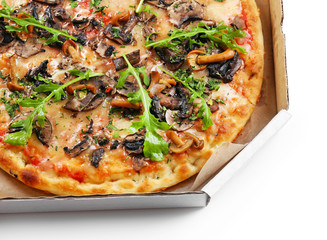 Tasty fresh pizza in carton box on white background, close up