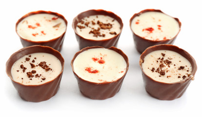 Assorted chocolate candies, isolated on white