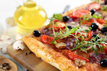 Rectangle delicious pizza on the table, close-up