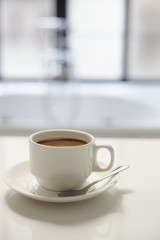 Close up cup of coffee in bathroom
