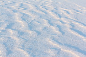 Natural snow background on a river surface in the winter