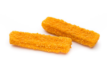 Frozen bread crumbed fish fingers on white.
