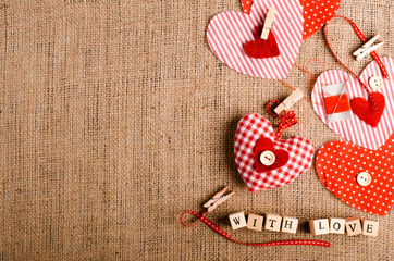 Sewing set: fabrics, threads, pins, buttons, tape, handmade hearts, words 