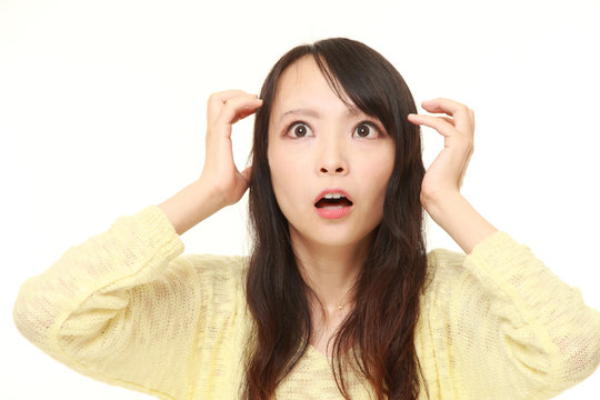 young Japanese businesswoman shocked