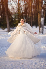 Fototapeta na wymiar The bride in winter, full length portrait