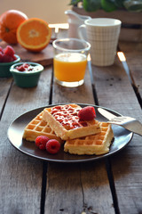 plate of waffles with raspberry marmalade