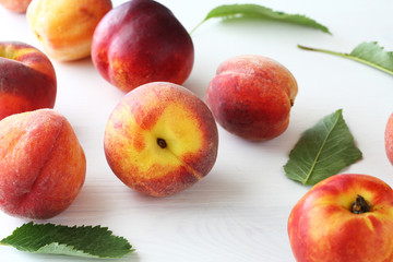 sweet peaches on white background