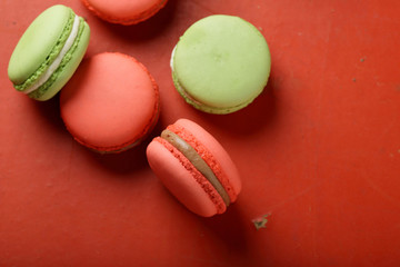 macaroons on red background