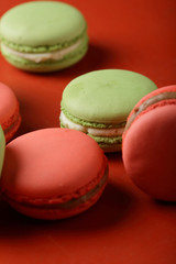 macaroons close-up on red background