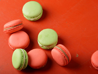 frecnh macaroons on red background