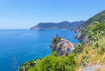 Fototapeta na wymiar Panorama of the Cinque Terre. In the foreground the town of Vernazza.
