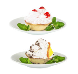 Set of cream cake with cherry and orange, chocolate on a white saucer, isolated on the white