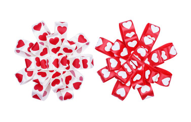 Set of round bows from ribbon hearts for St. Valentine's Day isolated on the white