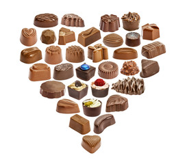 Set of chocolate candie, chocolate collection. Heart from chocolate candies isolated on white background