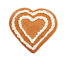 Handmade heart shaped gingerbread cookie isolated on white background